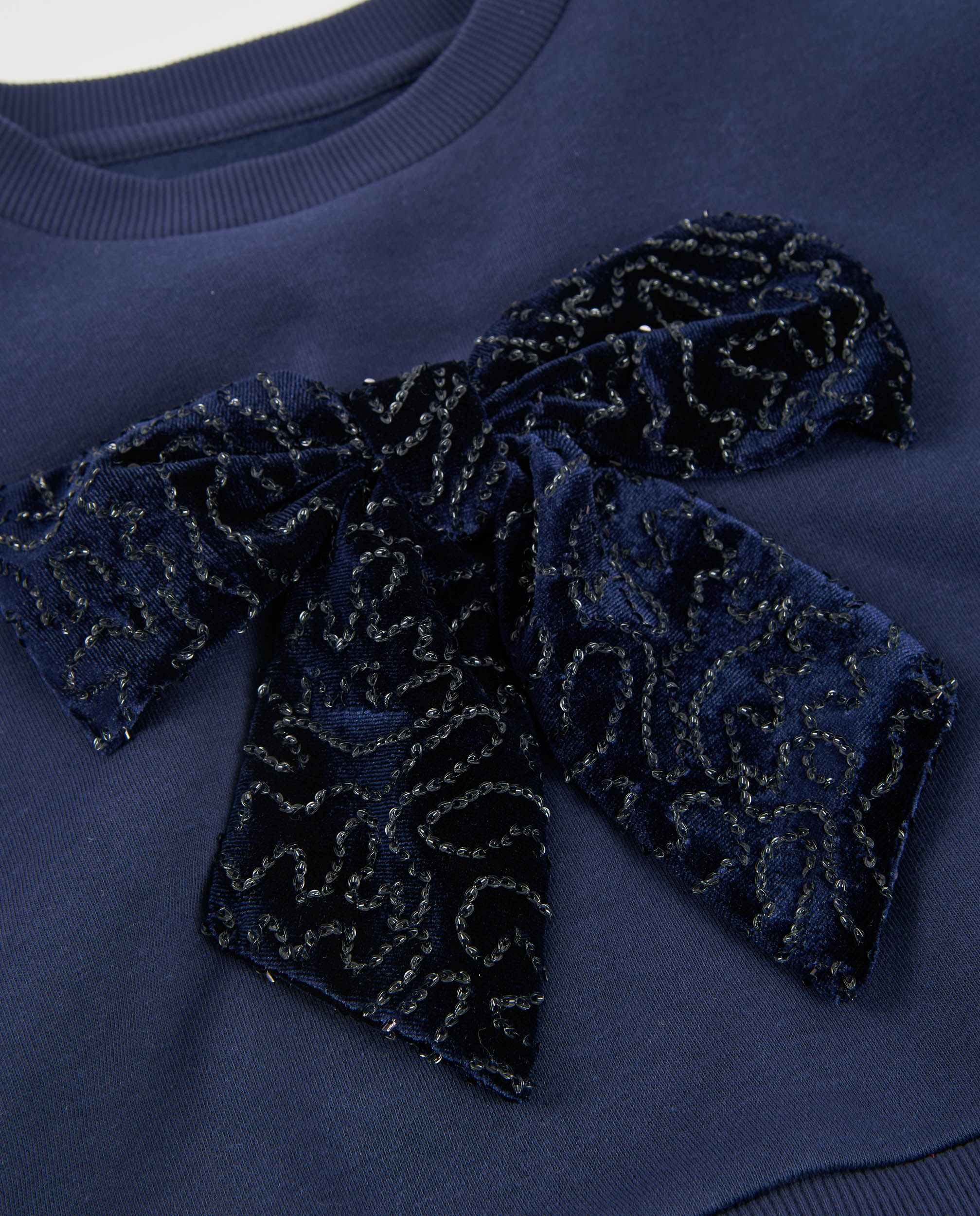 Sudadera de niña de felpa con lazo decorativo y puños acanalados