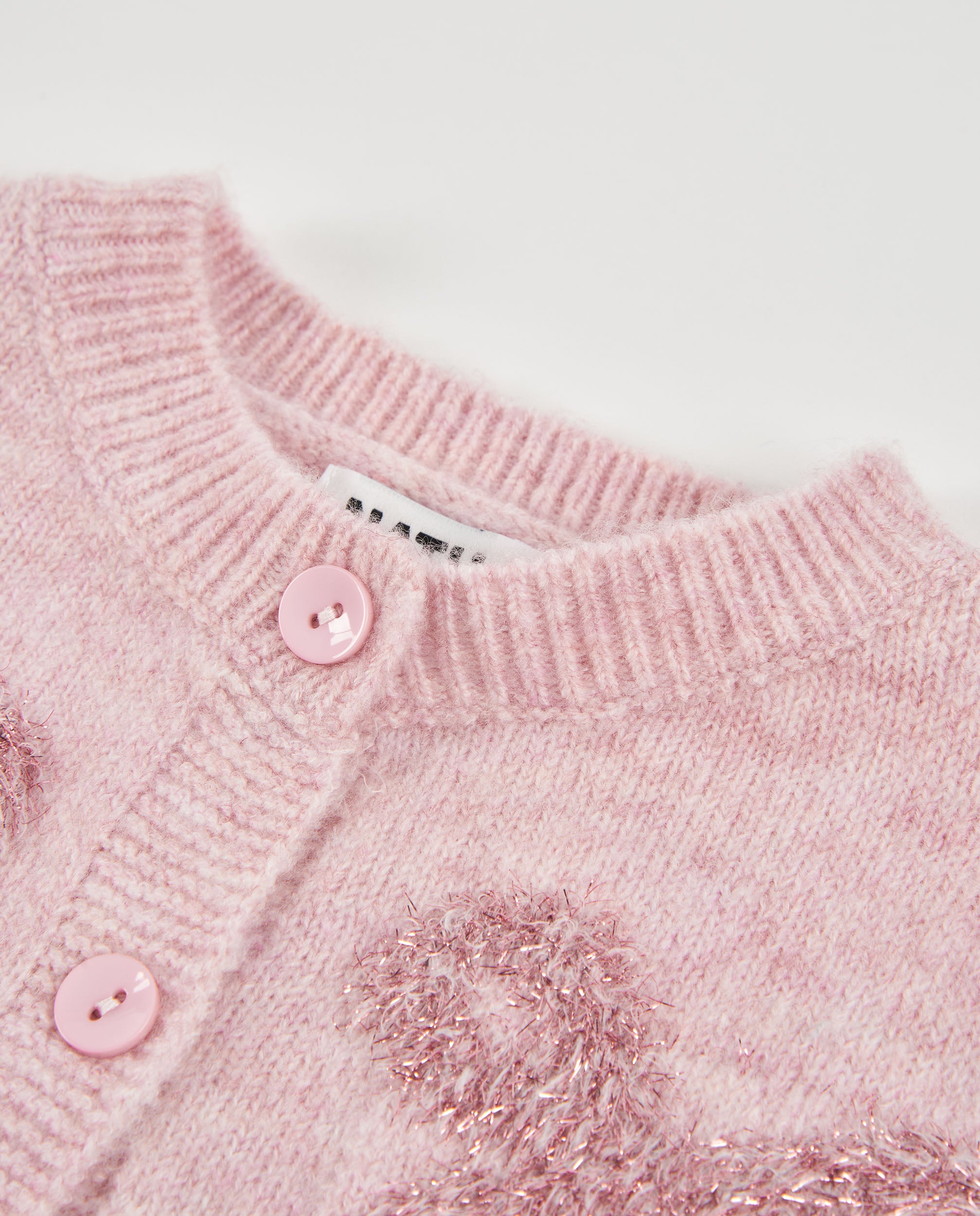 Chaqueta de niña de tricot con lazos y botones