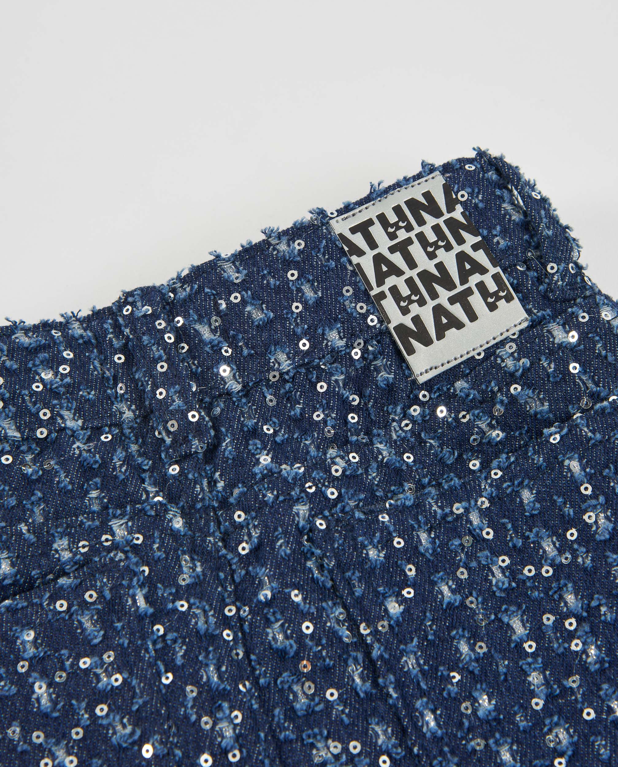 Falda de niña de denim con lentejuelas y corte mini
