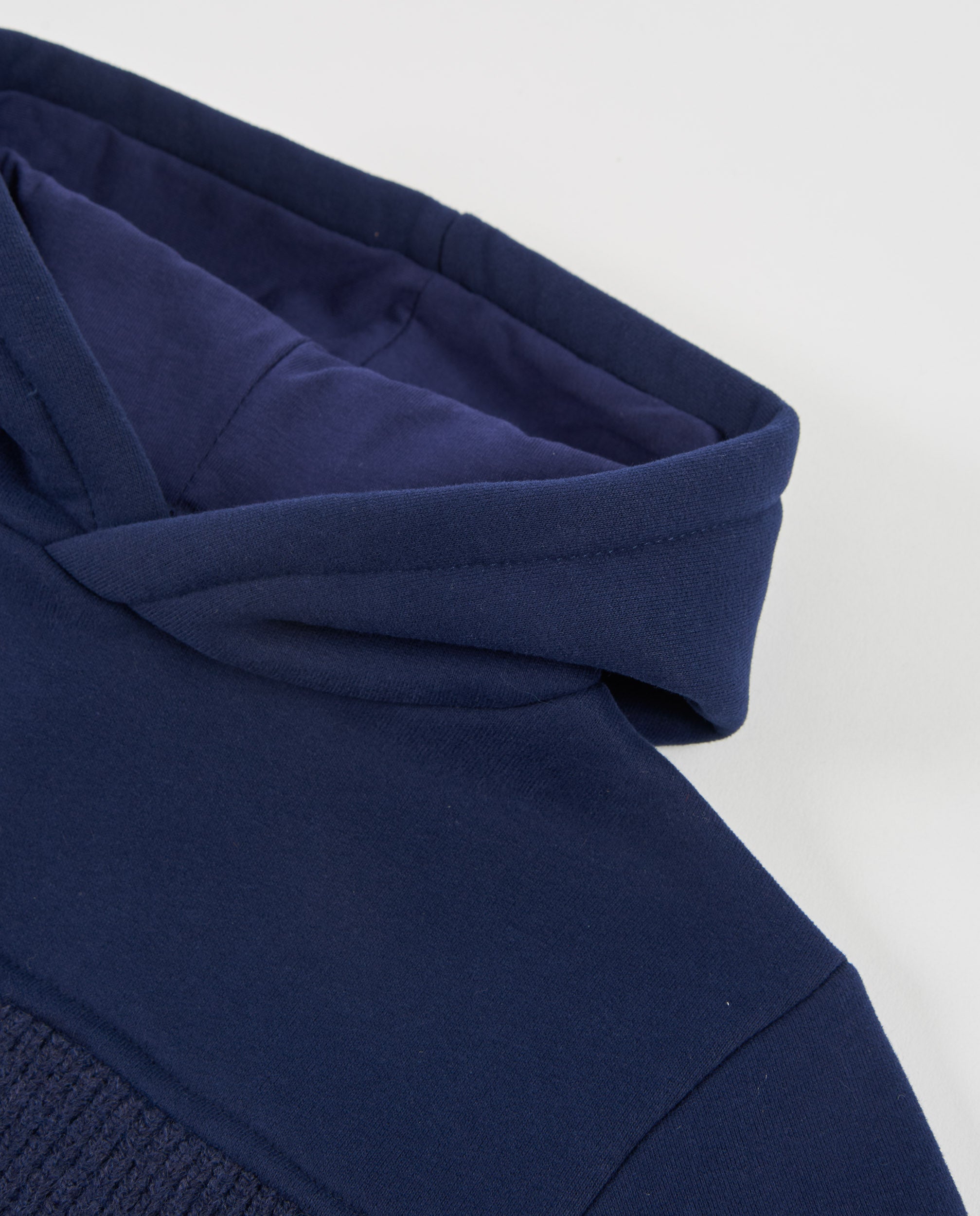 Jersey de niño de tricot con capucha y tejido cálido