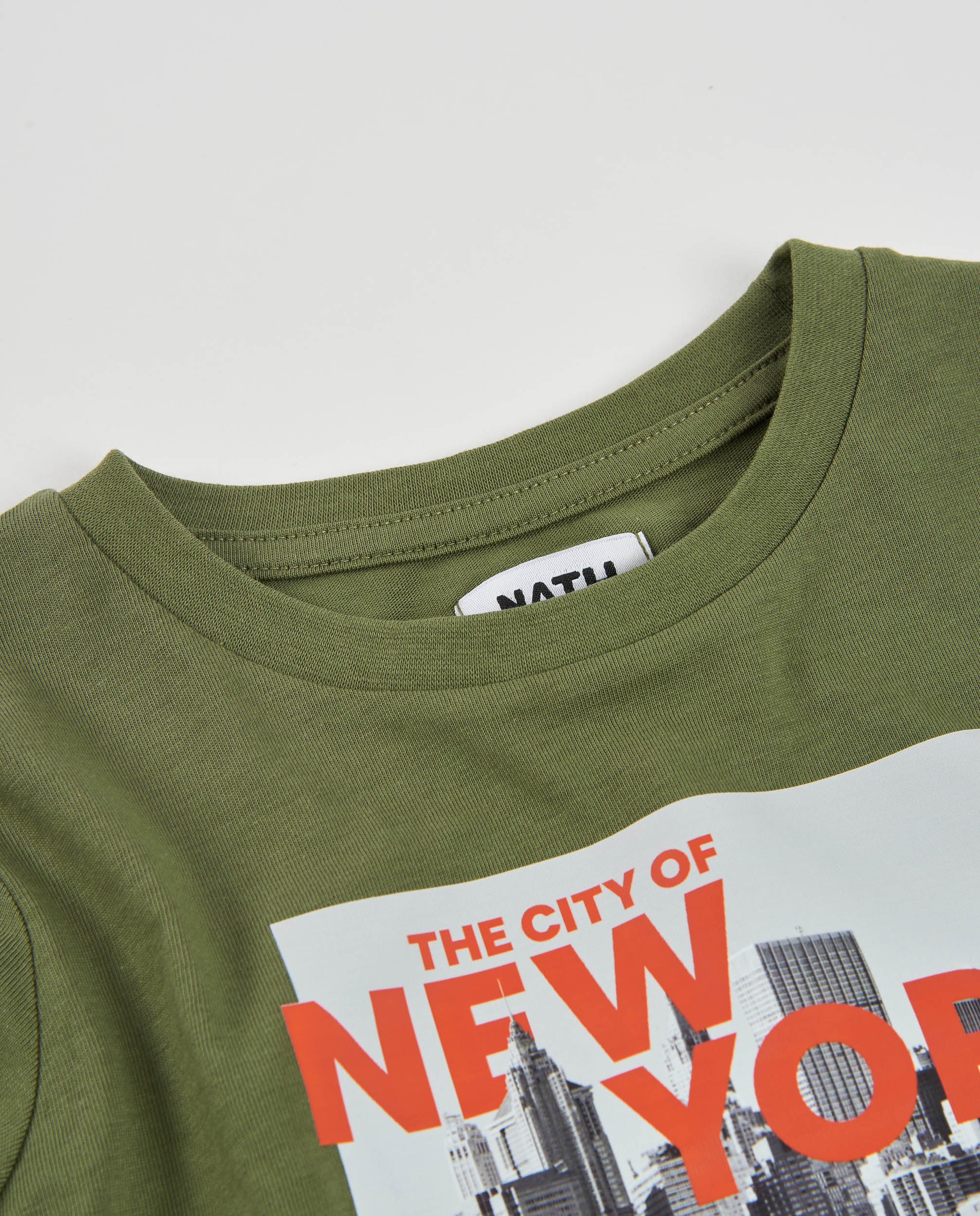 Camiseta de niño de punto con estampado de ciudad y manga larga