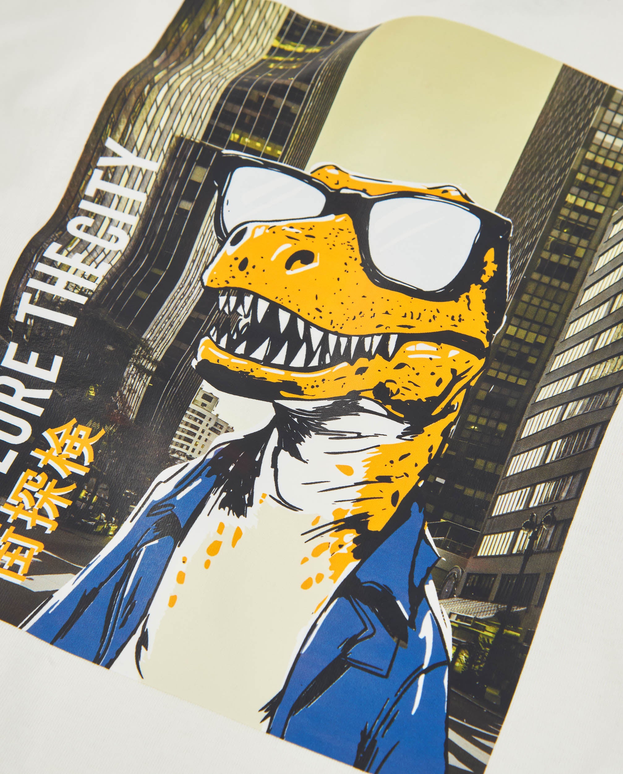 Camiseta de niño de punto con estampado de dinosaurio con gafas