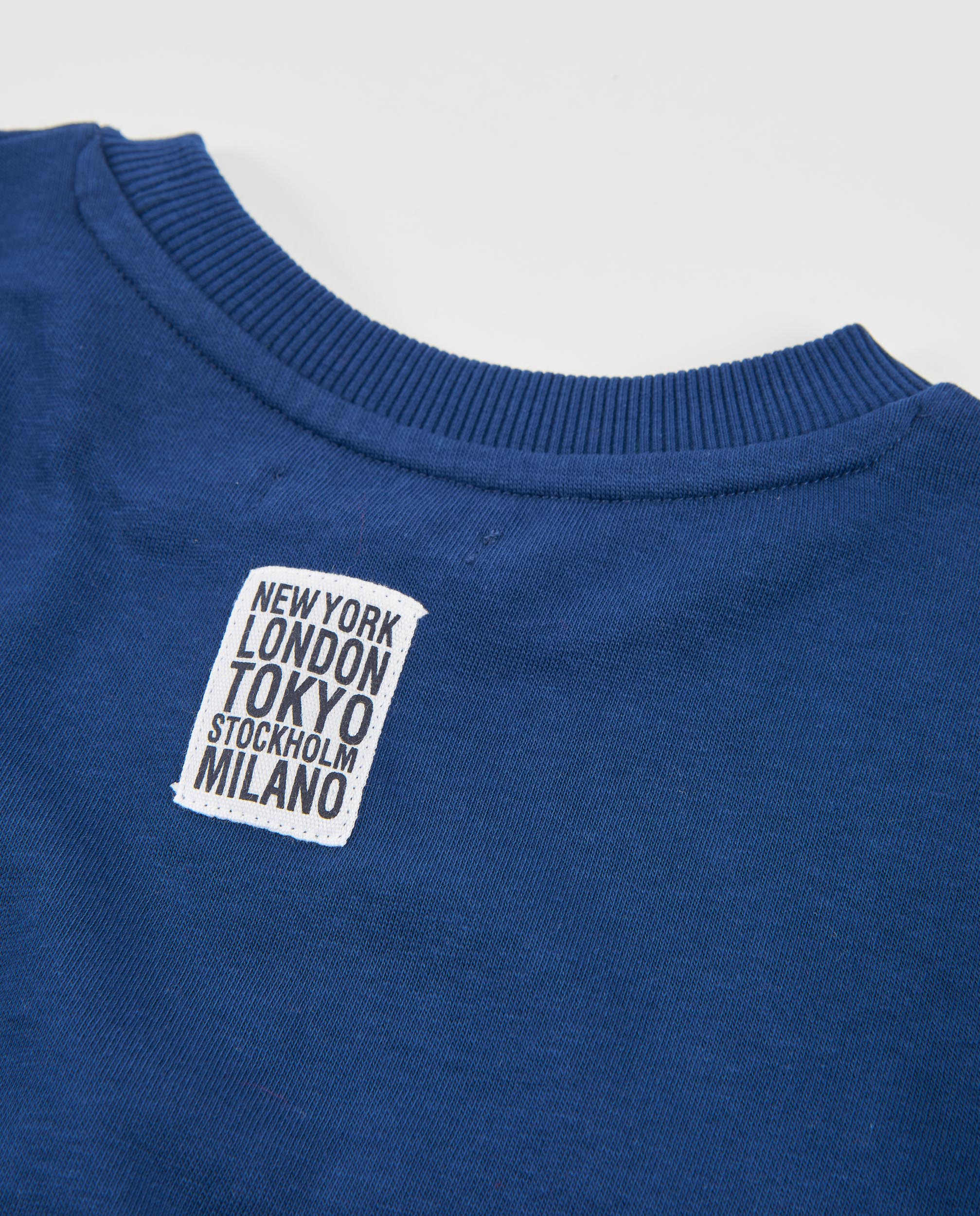 Sudadera de niño de punto con print urbano y cremallera lateral