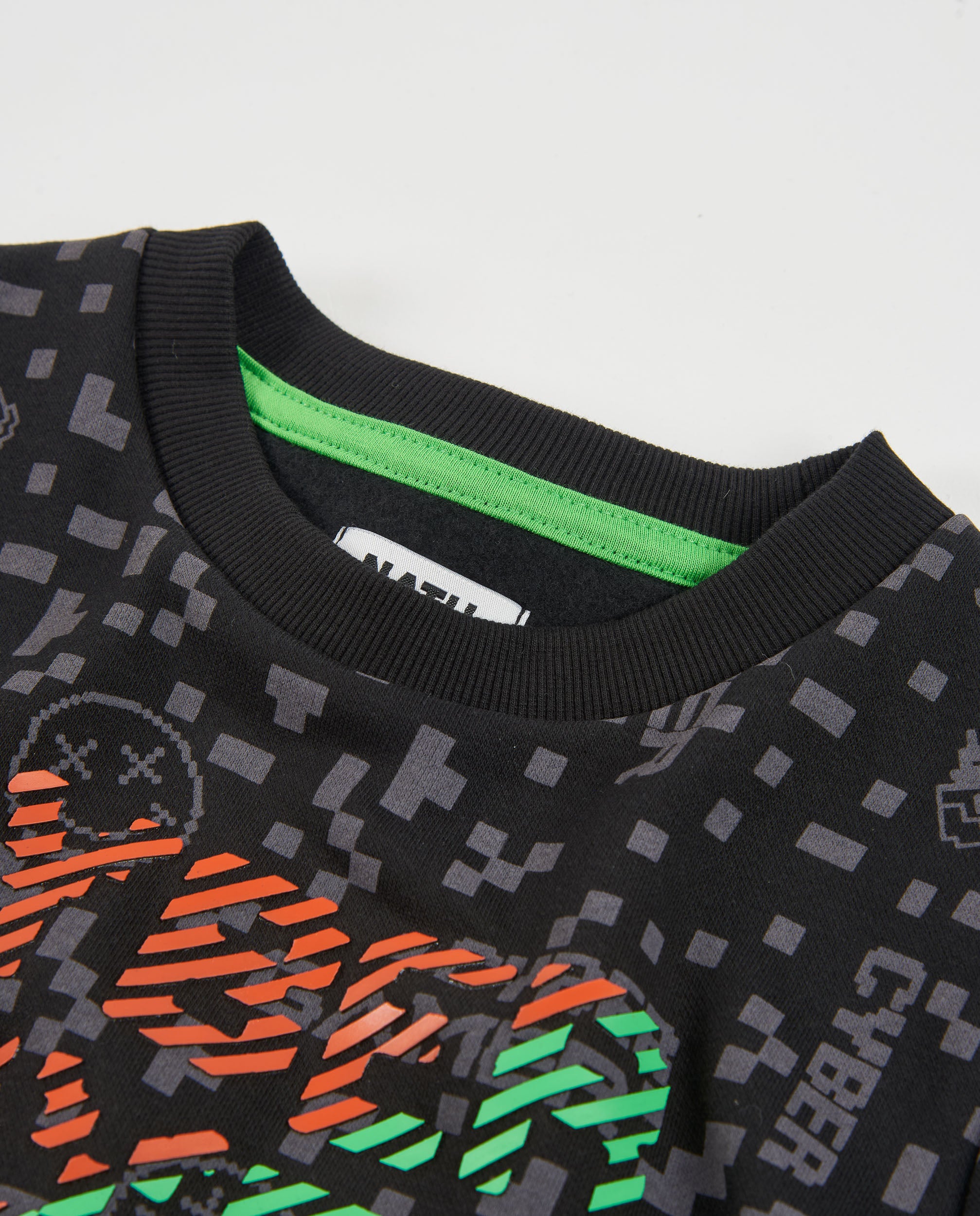 Sudadera de niño de felpa con estampado pixelado y puños elásticos