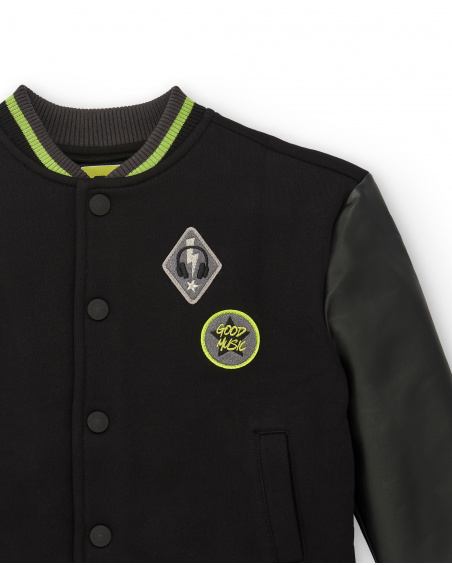 Black varsity jacket with green details for boys from The Real Beat collection