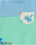 Boys' outfit with blue and green T-shirt and white shorts with palm tree and sun print