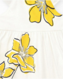 White dress for girls with yellow floral print and ruffles