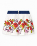 White skirt for girls with floral print and navy blue elastic waistband
