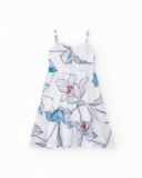 White girls' dress with straps and a floral print.