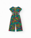 Tropical-print jumpsuit for girls with front buttons and side openings.