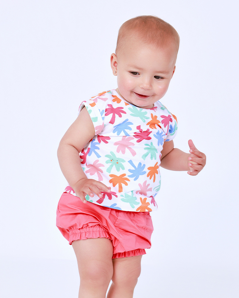 White and coral outfit for girls with tropical leaf T-shirt and ruched shorts