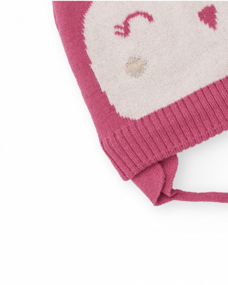 Knit hat for girl in pink with smiling face design