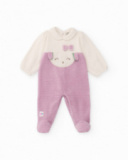 Velvet romper for newborn in cream and lilac tones with embroidered face design.