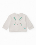 Baby boy outfit with white sweatshirt and pants featuring animal faces