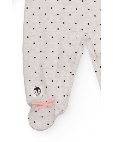 Light grey knitted romper for girl with black polka dot print.