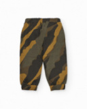 Jogger pants for boys with camouflage print in green and mustard tones.