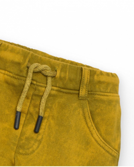 Green jogger pants for boys with fun print on the pocket.