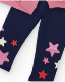 Girl’s outfit with pink sweatshirt featuring embroidered star and navy blue leggings with star