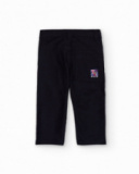 Twill pants for boys in navy blue with back pocket and embroidered detail.