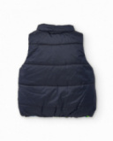 Reversible padded vest for boys with spaceship print Reversible padded vest for boys with spaceship print