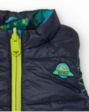 Reversible padded vest for boys with spaceship print Reversible padded vest for boys with spaceship print