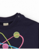 Navy blue dress for girl with planet print and pink bow detail.