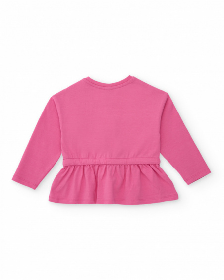 Pink long-sleeve blouse for girl with space print and ruffled waistband.