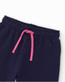Navy blue knit pants for girl with pink adjustable drawstring.