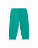 Boys' green knit pajamas with a fun monster print.