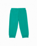 Boys' green knit pajamas with a fun monster print.