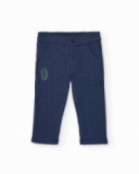 Boys' navy blue knit pants with pine tree embroidery.