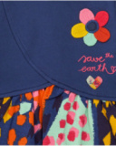 Girls' navy blue knit dress with flower appliqué and printed skirt.