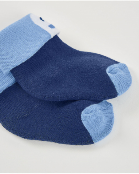 Socks for newborn in navy blue and light blue with smiley face detail.