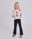 Flared pants for girls in navy blue with embroidered detail Flared pants for girls in navy blue with embroidered detail
