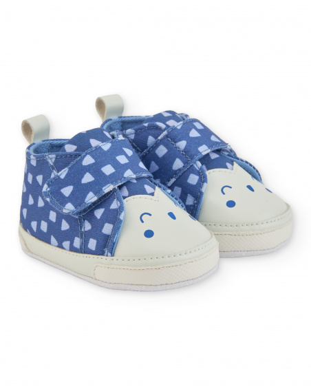Prewalker shoe for newborn in blue with geometric print and face detail