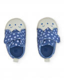 Prewalker shoe for newborn in blue with geometric print and face detail