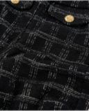 Girls’ black tweed trousers with grey checks