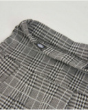 Girl’s checked skirt with pleated design