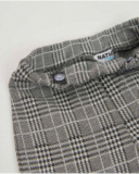 Girls’ check trousers in grey tones with a straight cut