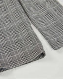 Girls’ check trousers in grey tones with a straight cut