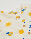 Knitted newborn romper with snap closure