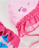 Newborn woven swimsuit with decorative ruffle