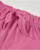 Girls’ knitted shorts with ruffle hem