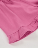 Girls’ knitted shorts with ruffle hem