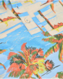 Boys knit T-shirt with a tropical print