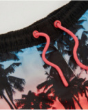 Boys’ woven swim shorts with contrast palm trees
