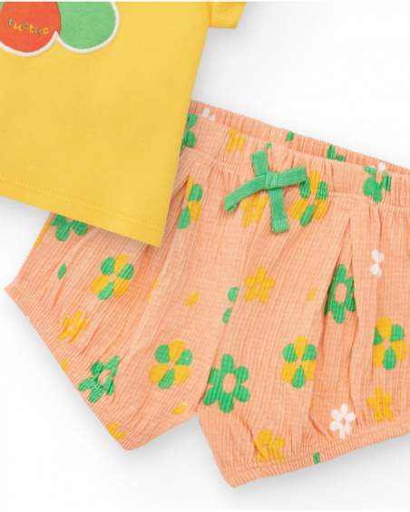 Girls' outfit with yellow T-shirt and pink floral shorts
