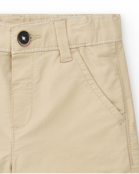 Short beige pants for boys with pockets and button closure
