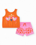Girls' outfit with orange animal T-shirt and pink spotted shorts
