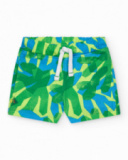 Boys' outfit with white T-shirt and tropical bermuda shorts